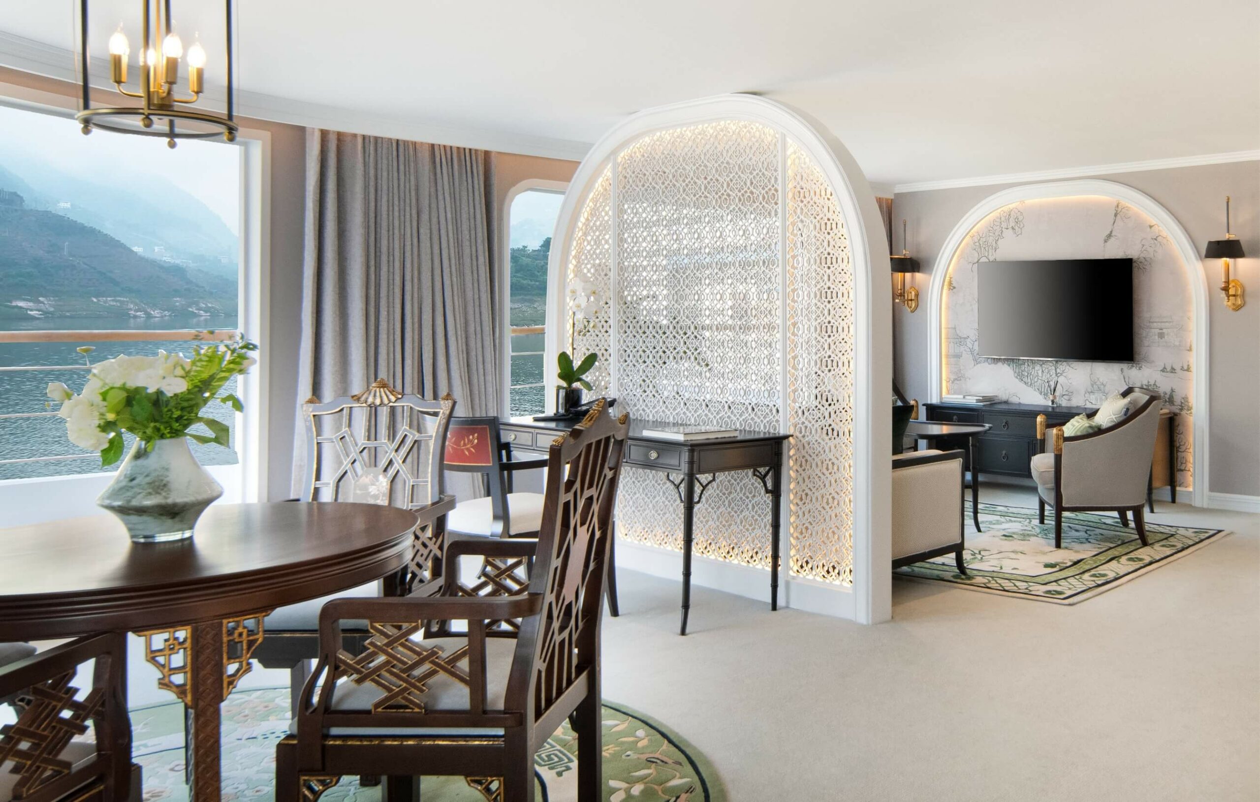 Spacious Celebrity Suite aboard Yangzi Explorer with private terrace and sitting area