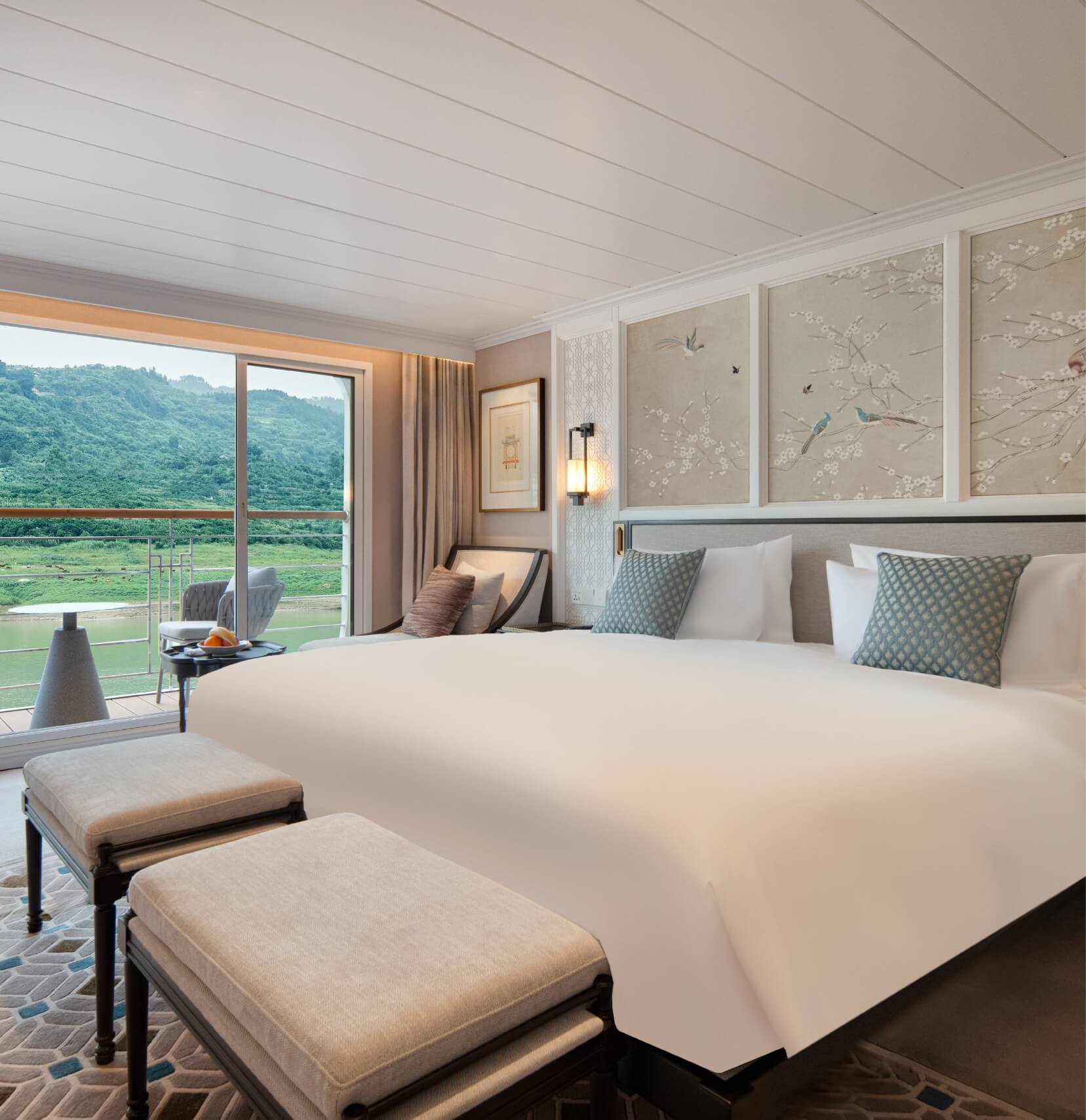 Elegant Deluxe Suite on Yangzi Explorer featuring a private balcony and modern amenities