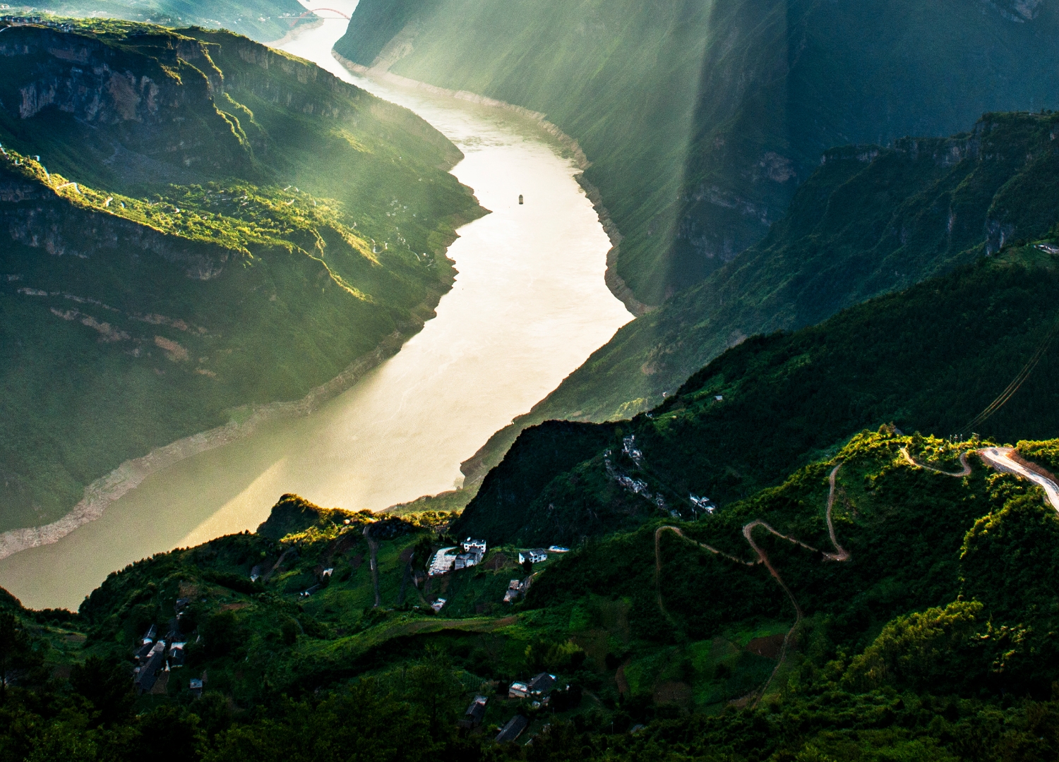 Sunlight over the Yangtze River and mountain landscape in the Three Gorges region
