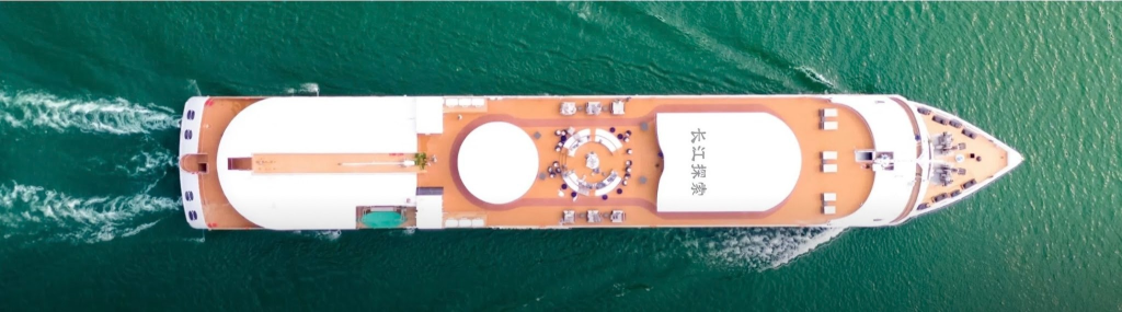 Aerial view of Yangzi Explorer cruise ship traveling on the Yangtze River
